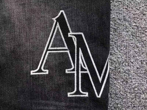 Calça Amiri Black Patch Jeans
