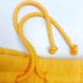 Calça Denim Tears Wreath x CPFM Yellow